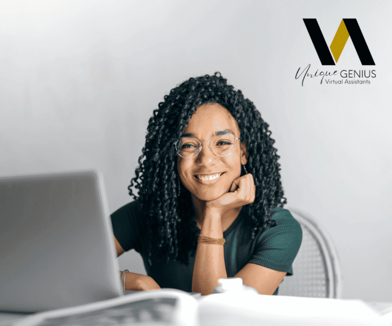 Woman smiling working from her laptop - unique genius