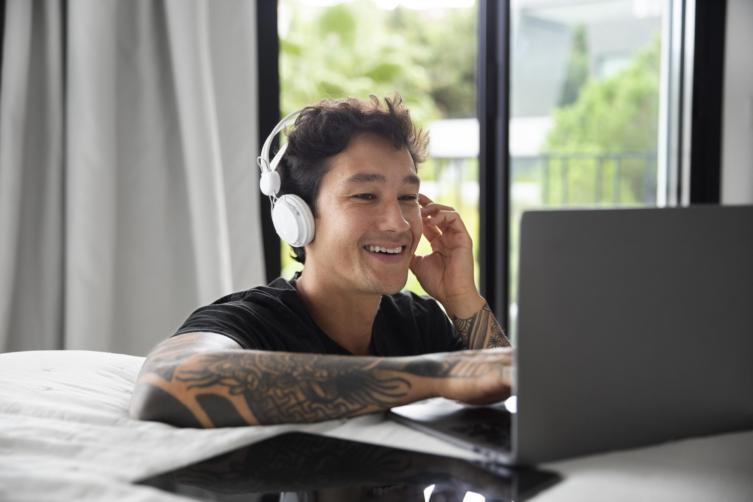 young person relaxing while listening music scaled